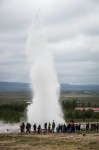 Strokkur erupting as seen from a distance